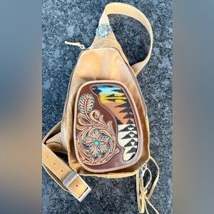 W Brand Designs handmade tooled leather sling bag